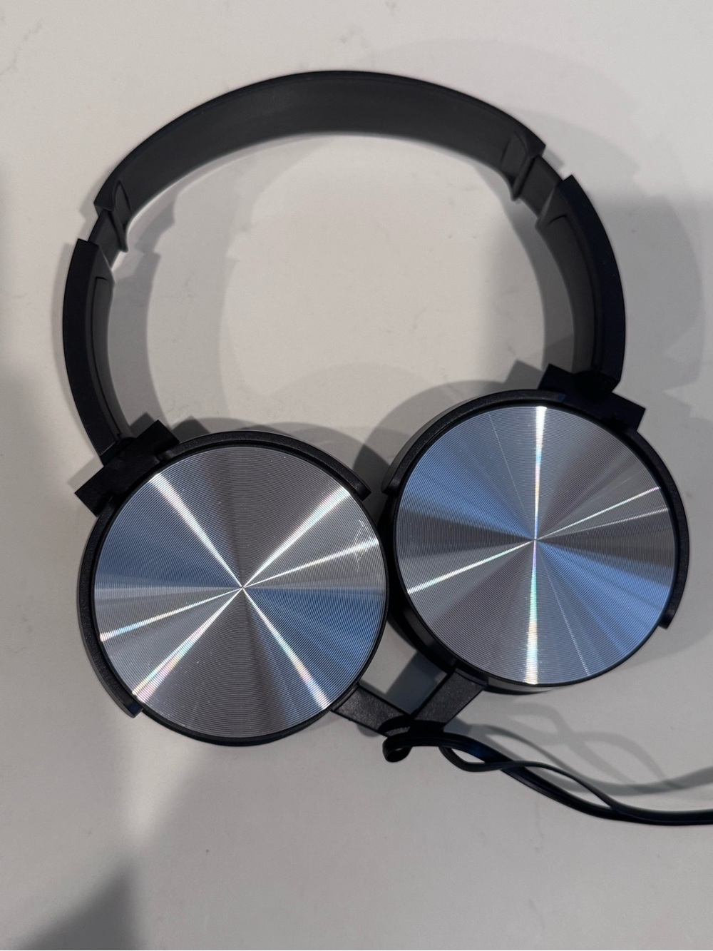 Sleek Silver Wired Over-Ear Headphones with Foldable Design